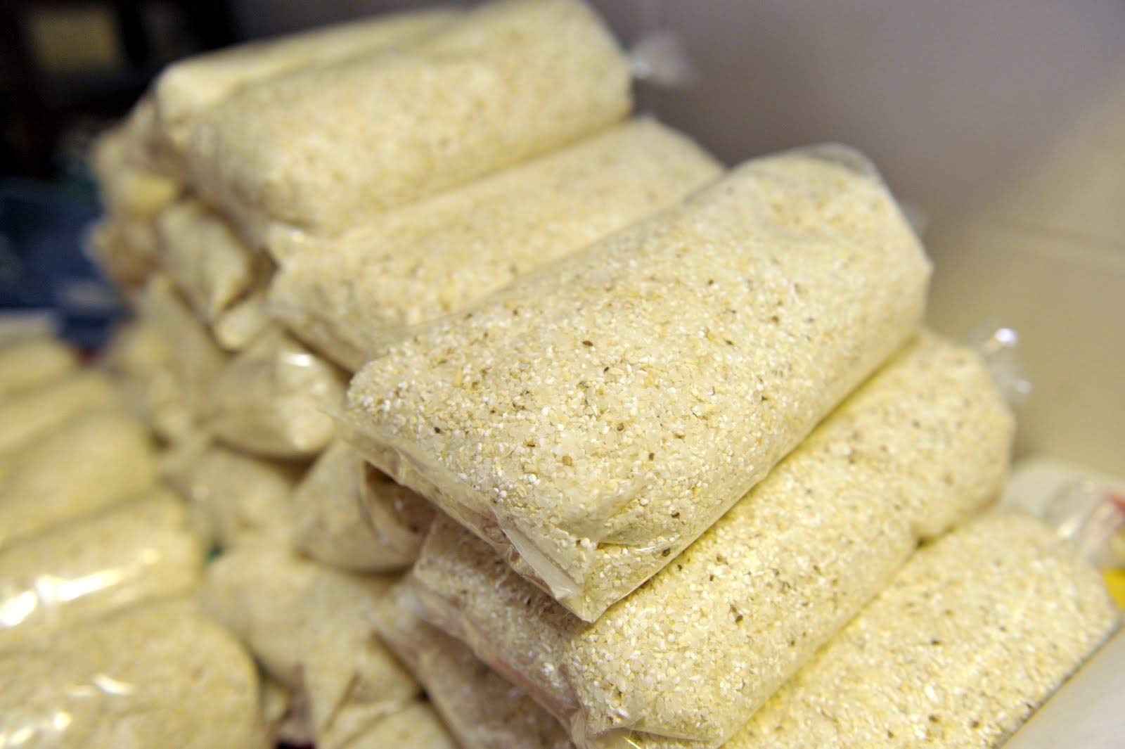Old School Brand open bag with white corn kernels highlighting pure ingredients