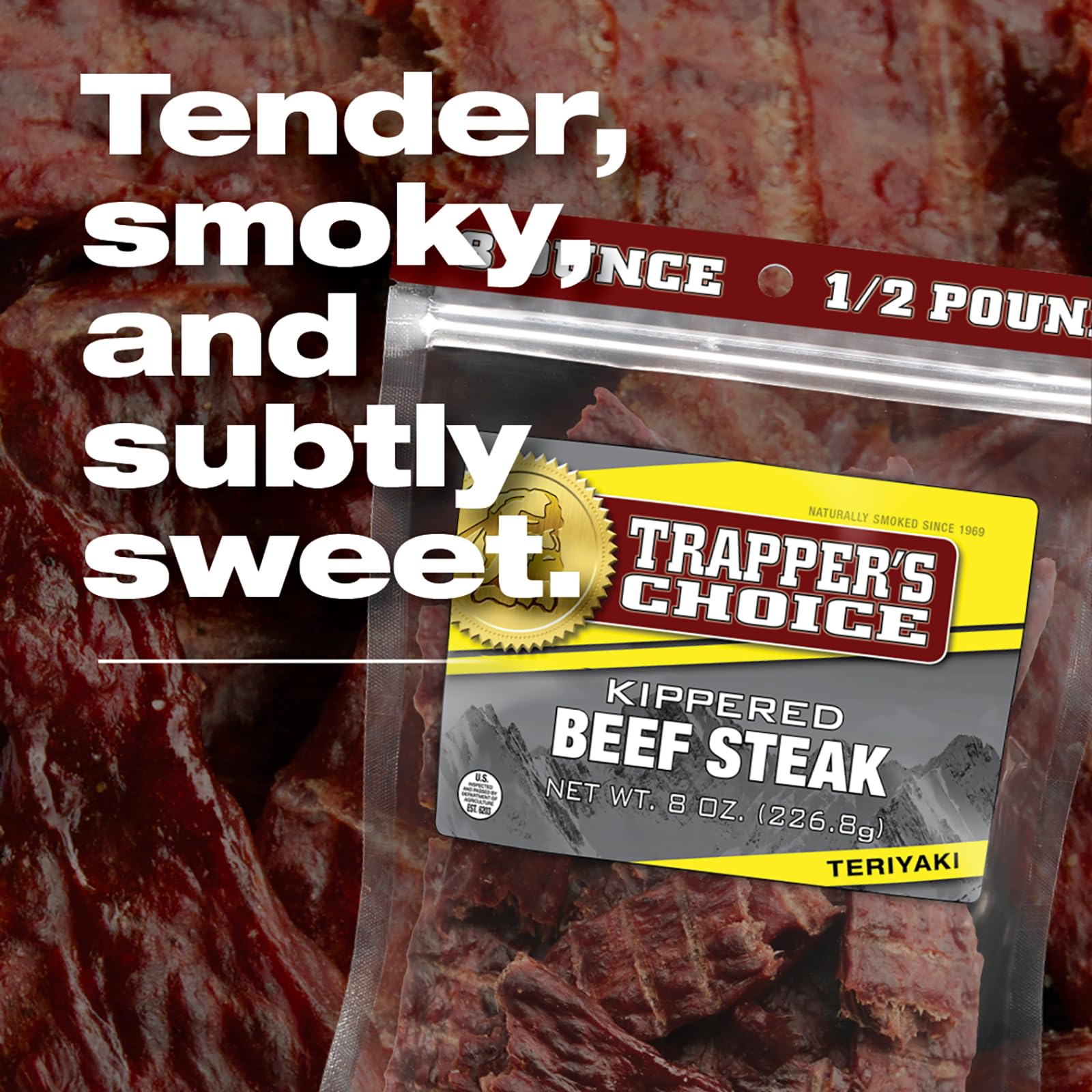 Old Trapper steak held in hand for scale, showing portion and portability