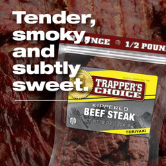 Old Trapper steak held in hand for scale, showing portion and portability