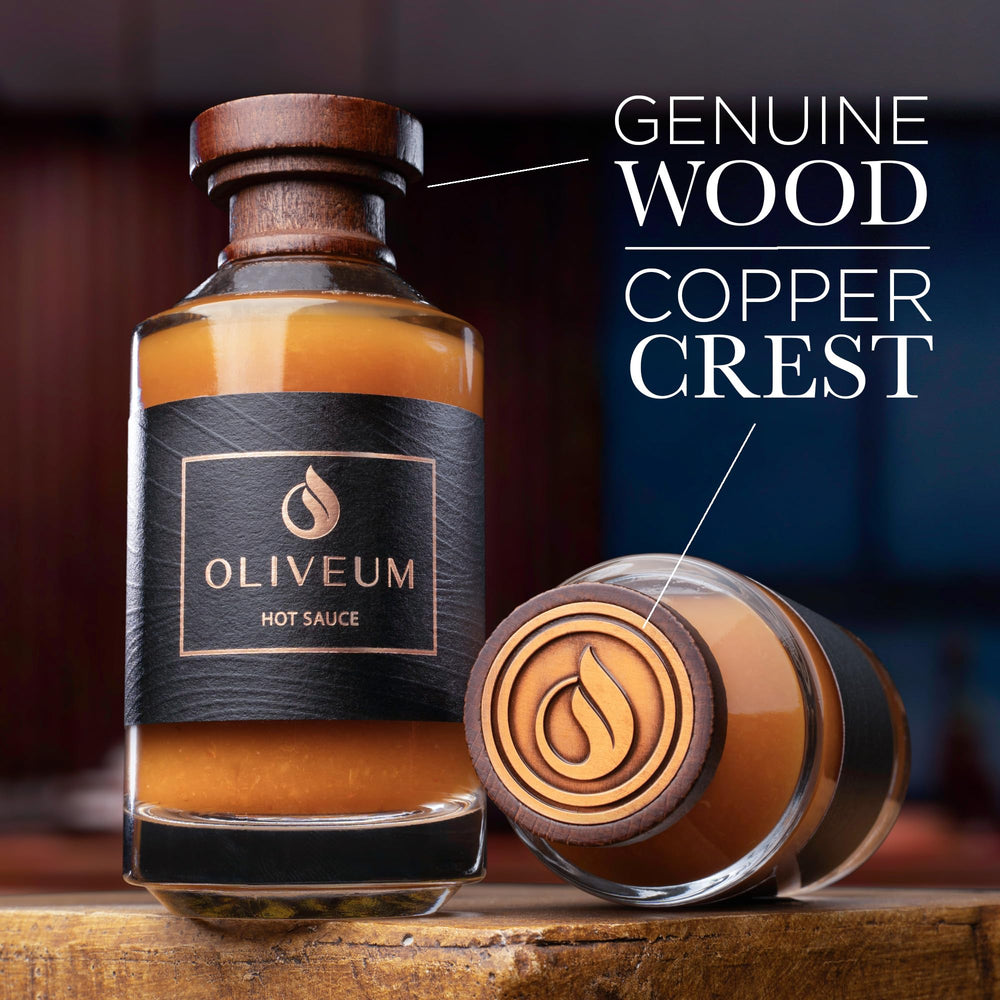 Oliveum sauce pouring to show texture and even heat for flavor boost