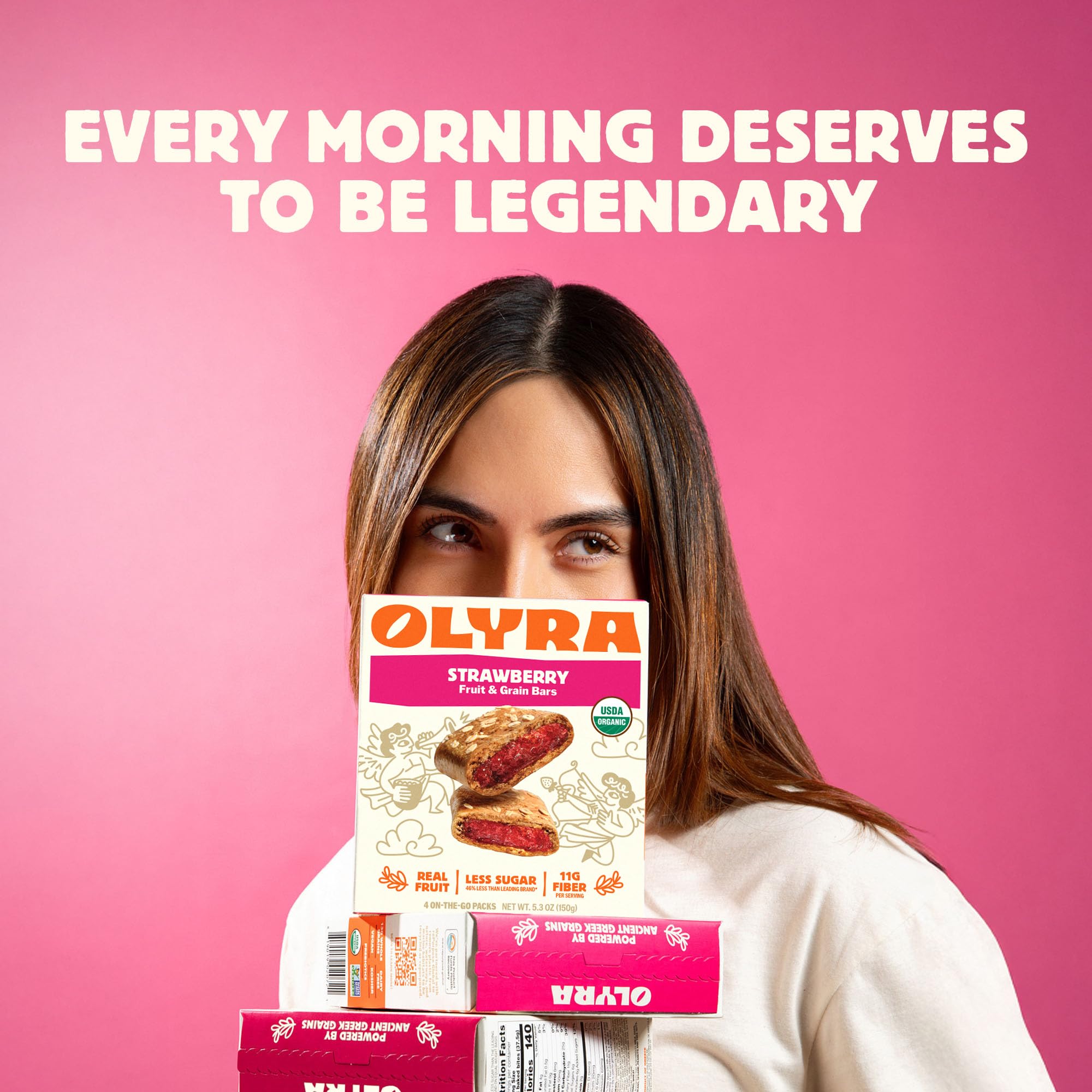 Olyra bar in hand demonstrating single-serving size and on-the-go ease