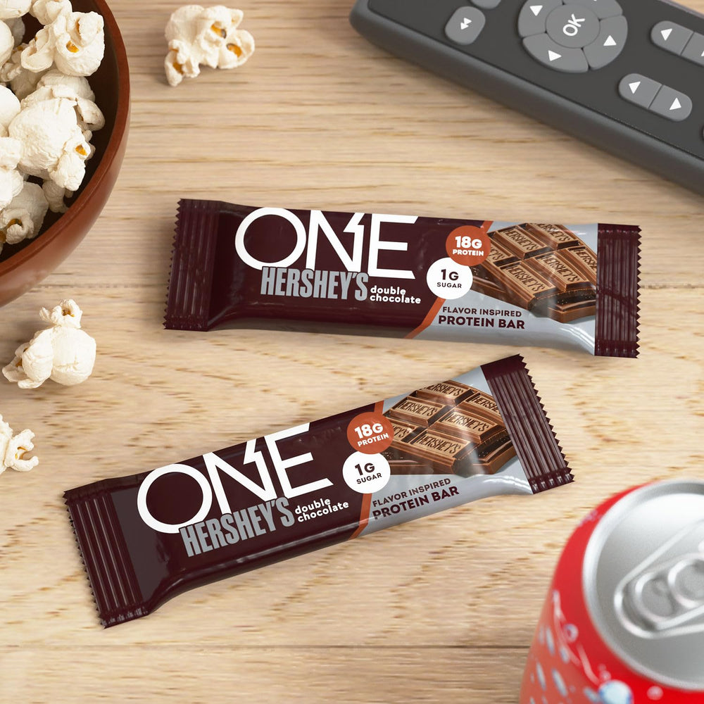 ONE Hershey's bar held in hand for scale and portable protein convenience