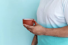 Oregon Chai concentrate pouring into glass demonstrating quick mixing