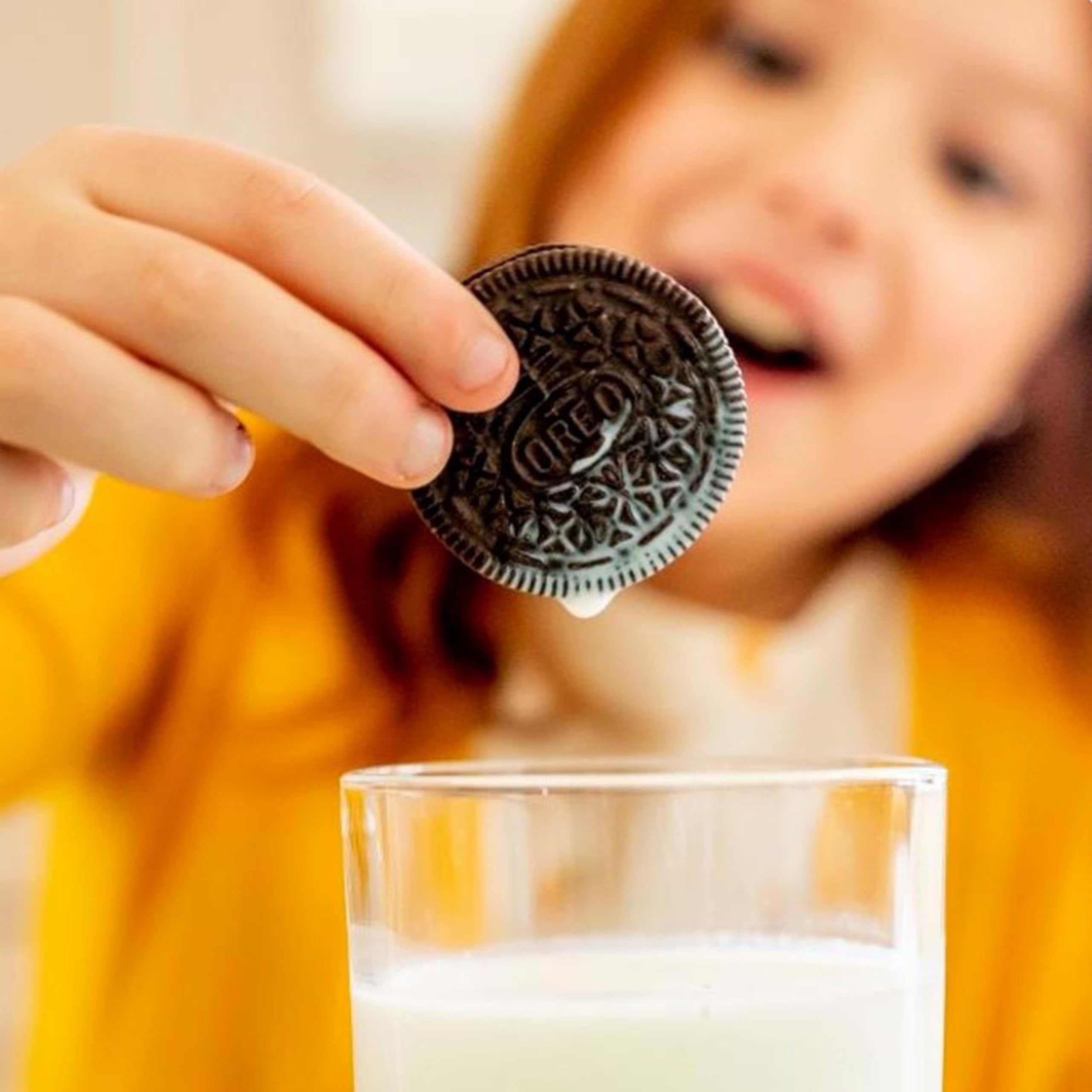 OREO snack pack held in hand showing compact portion size