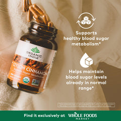 ORGANIC INDIA single cinnamon capsule close-up highlighting vegan capsule quality and easy swallowing
