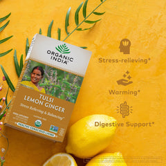 ORGANIC INDIA steeped cup of tulsi lemon ginger tea with steam, highlighting bright citrus aroma