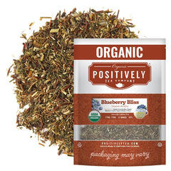 Organic Positively Tea front packaging showing blueberry rooibos and benefits