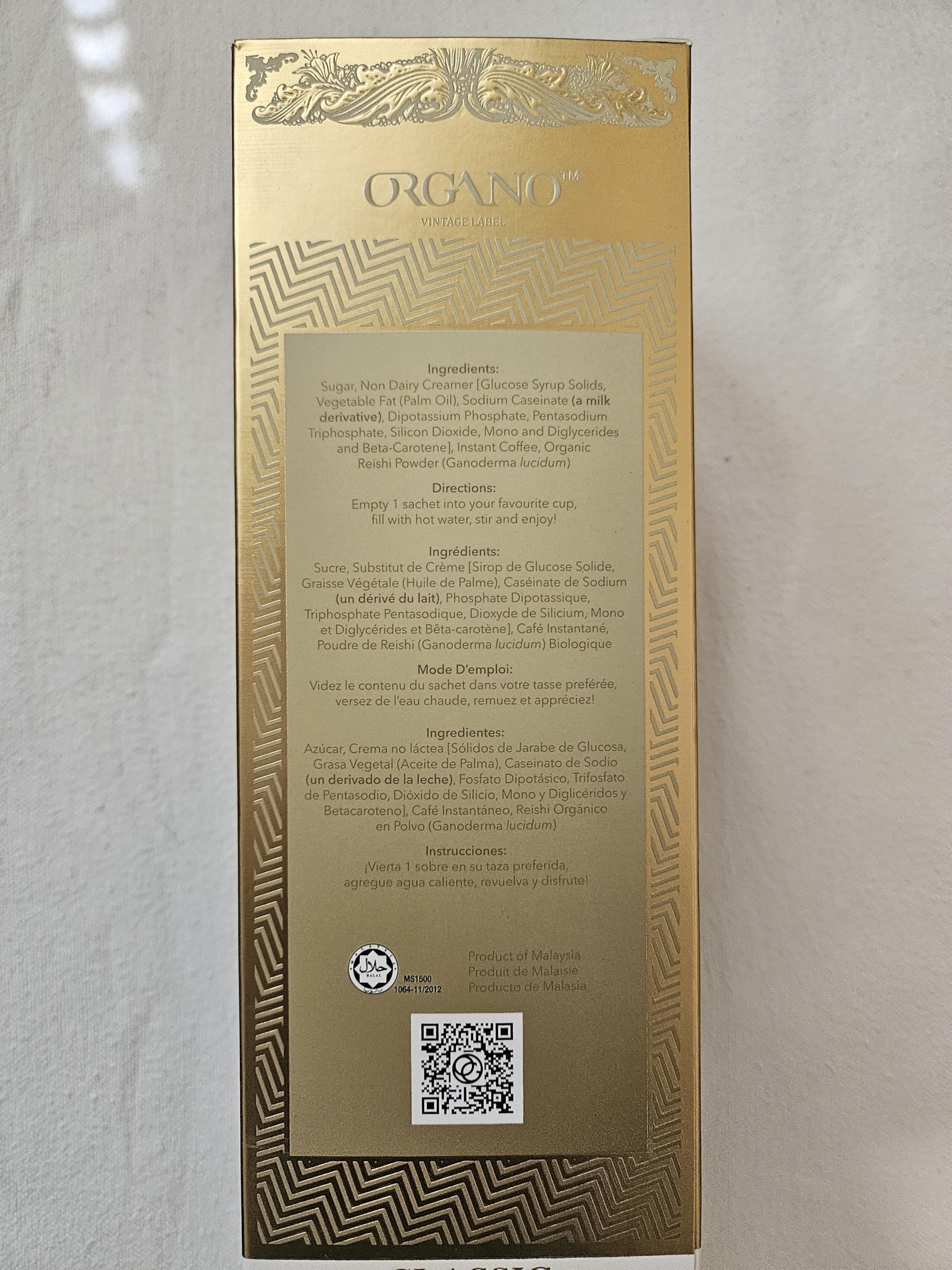 ORGANO boxes beside a standard mug showing pack size and travel-friendly scale