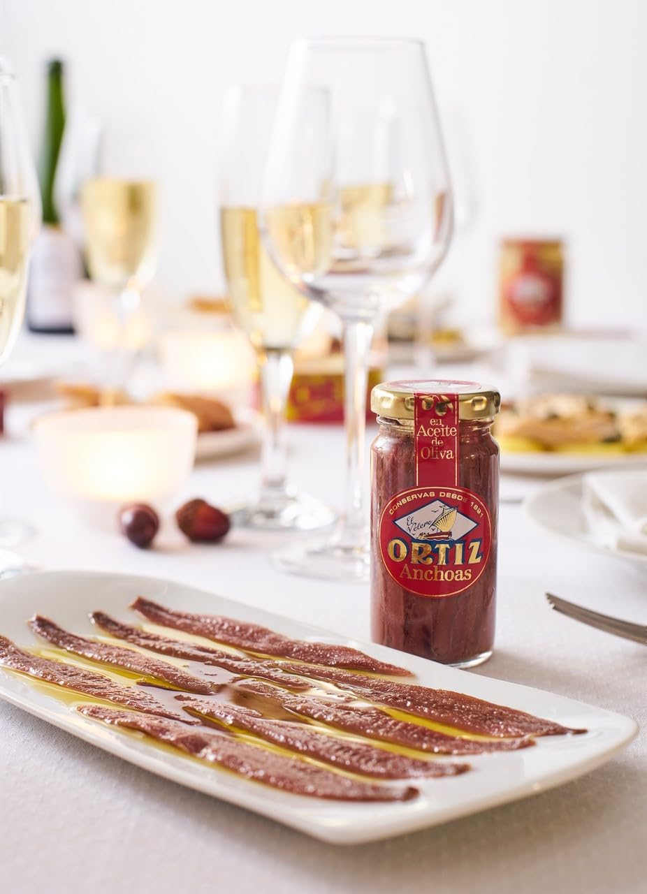 Ortiz anchovies garnishing pasta to boost umami and sauce depth