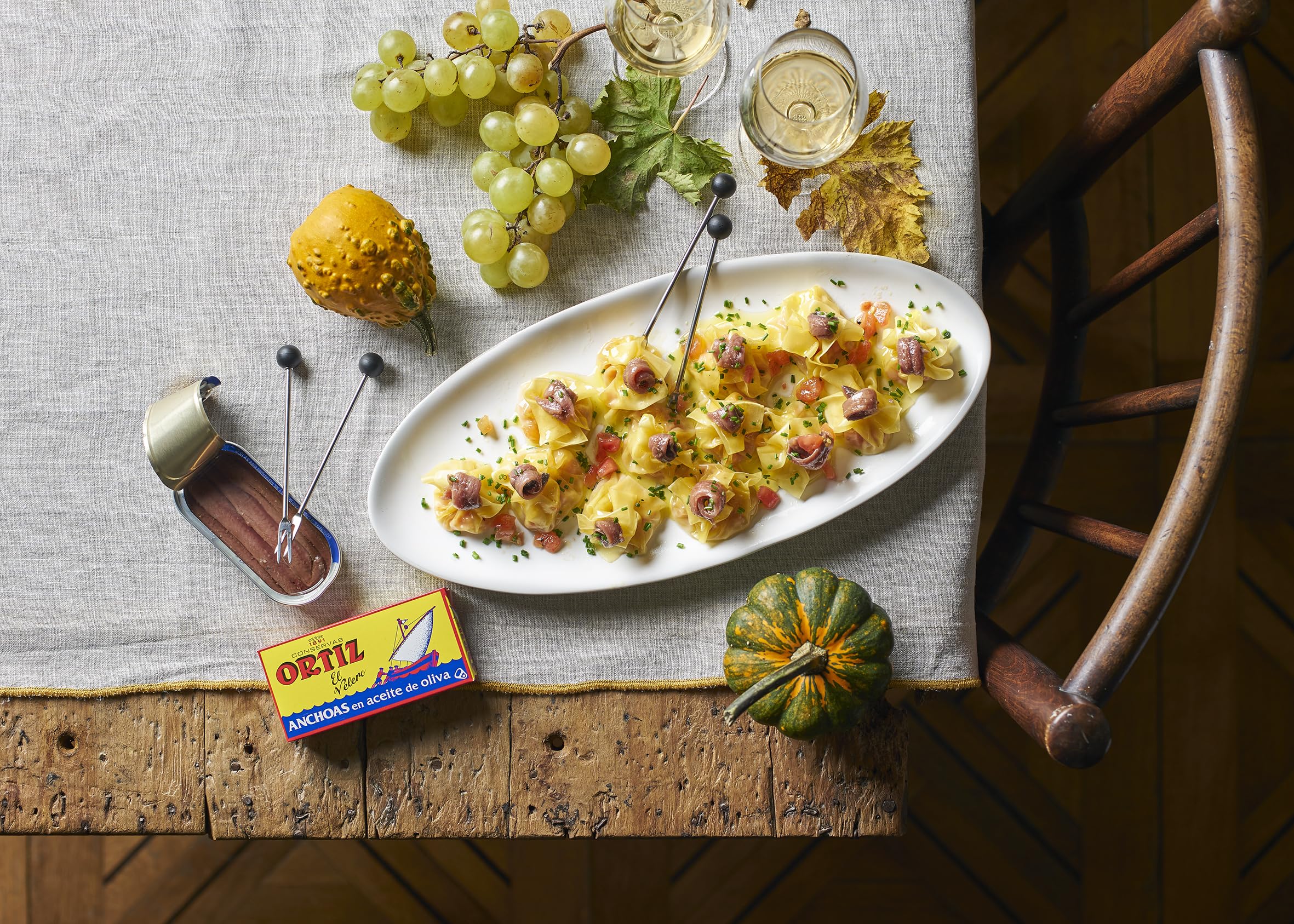 Ortiz anchovies on pizza slice, adds savory umami topping benefit