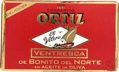 Opened Ortiz tin displaying tender ventresca fillets for immediate use
