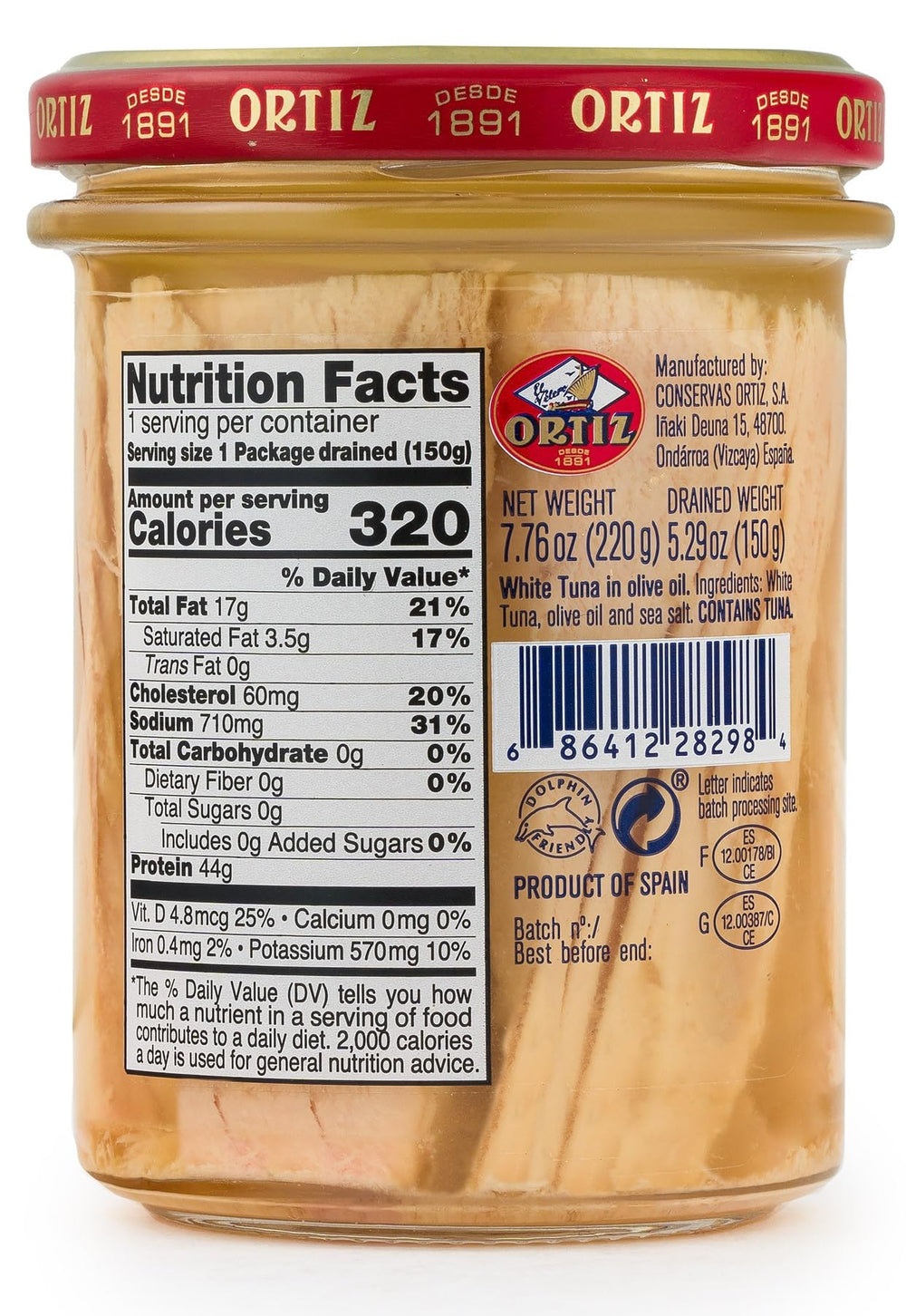 Ortiz open jar revealing tender white tuna flakes in olive oil for ready-to-eat use