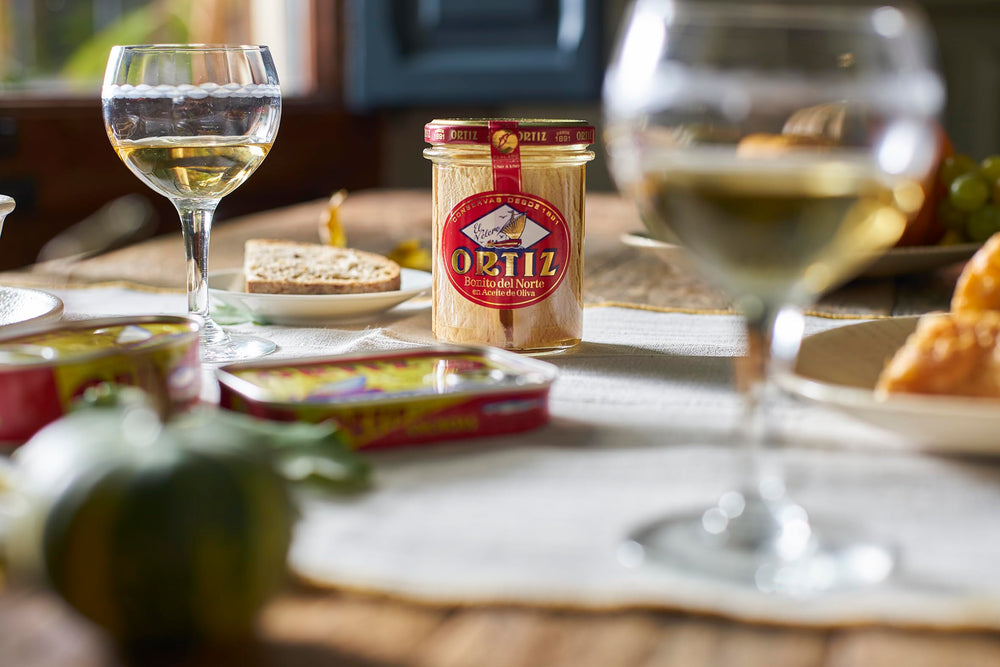 Ortiz jar next to a lemon and fork showing scale and portion guidance benefit