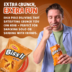 Osem Bissli bag beside a hand showing 1.23 oz scale for portion control