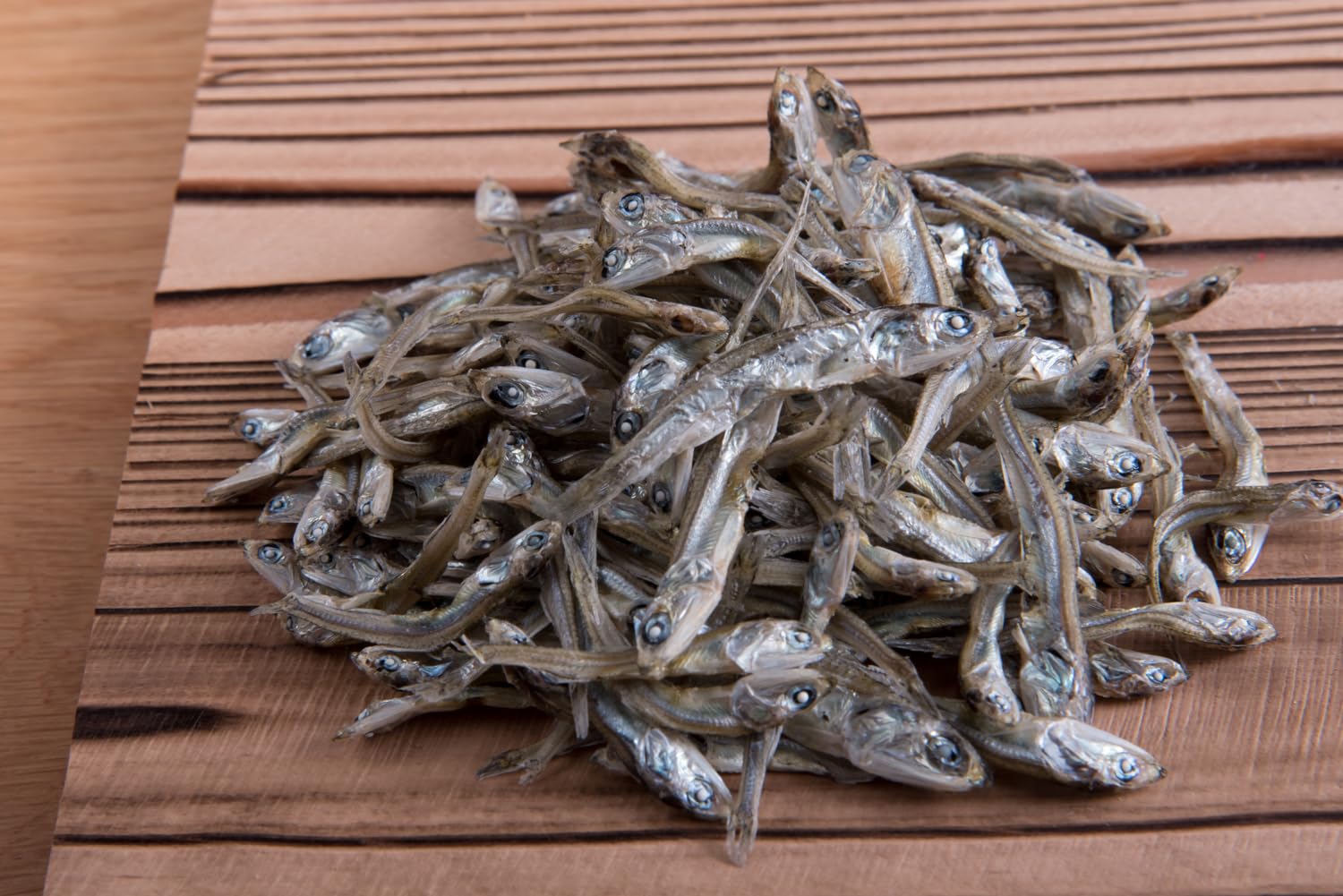 OSK niboshi close-up texture of dried small sardines, illustrating natural umami and quality