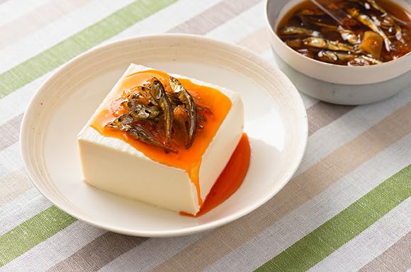 OSK niboshi being toasted in a pan, showing crisping method and improved aroma