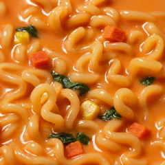 OTOKI open bowl revealing creamy cheese-chili broth that promises rich flavor