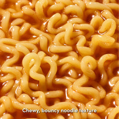 OTOKI Jin Ramen Spicy bowl in microwave ready to heat, illustrating convenient five-minute preparation