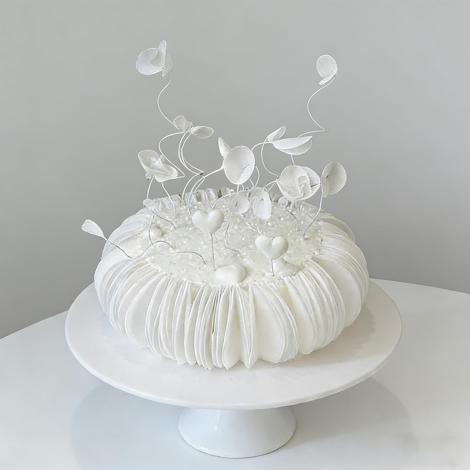 OUPUPA assembled rose on cupcake, creates delicate edible floral toppers