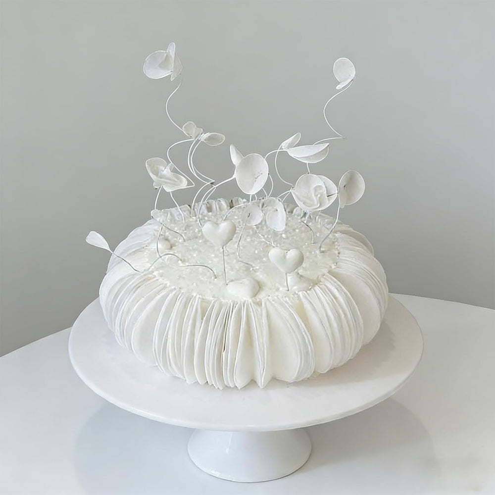 OUPUPA assembled rose on cupcake, creates delicate edible floral toppers