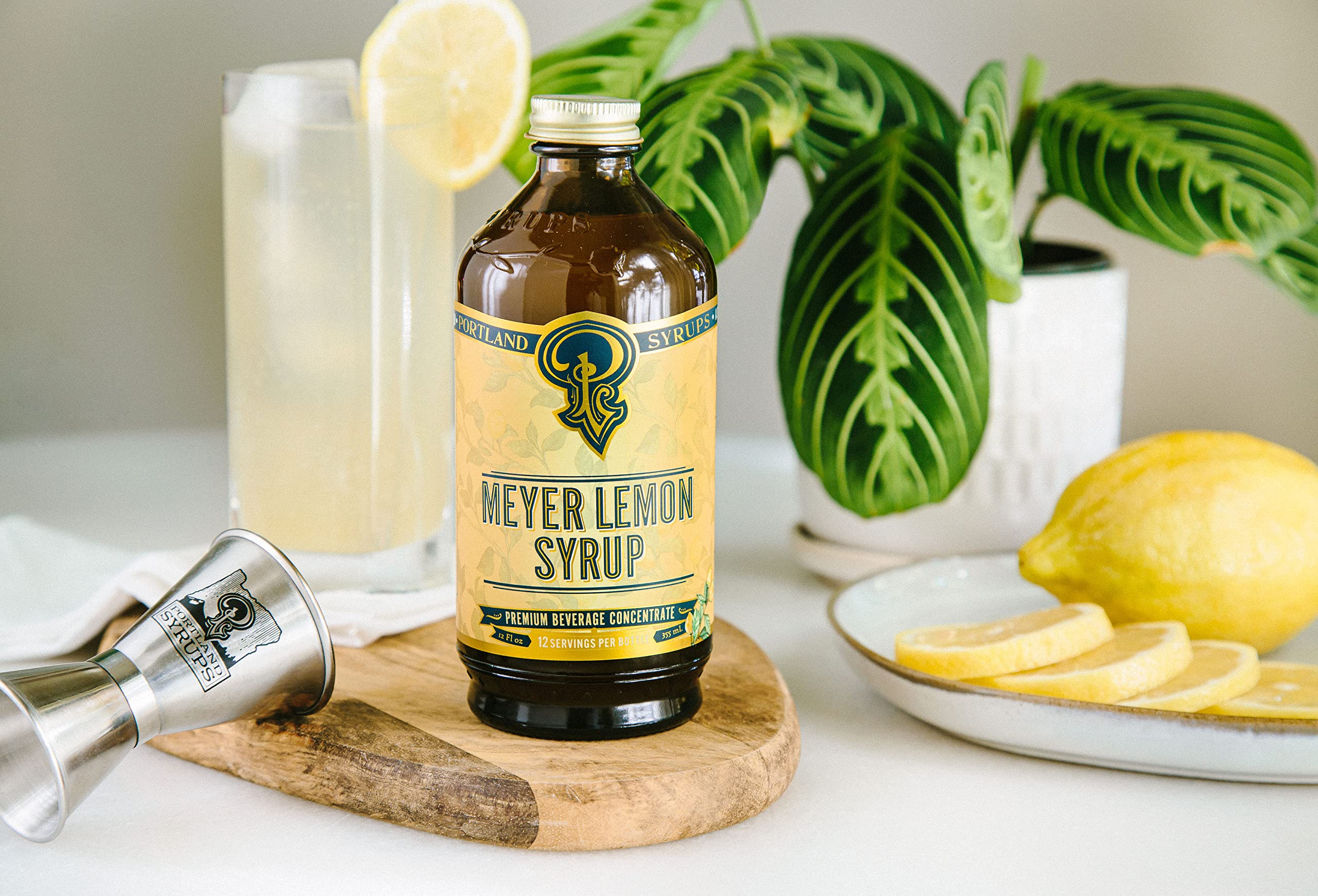 P Portland Syrups Meyer Lemon soda glass with bottle showing serving size and dilution ratio