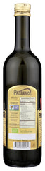Paesano pouring oil from bottle into dish demonstrating easy drizzle benefit