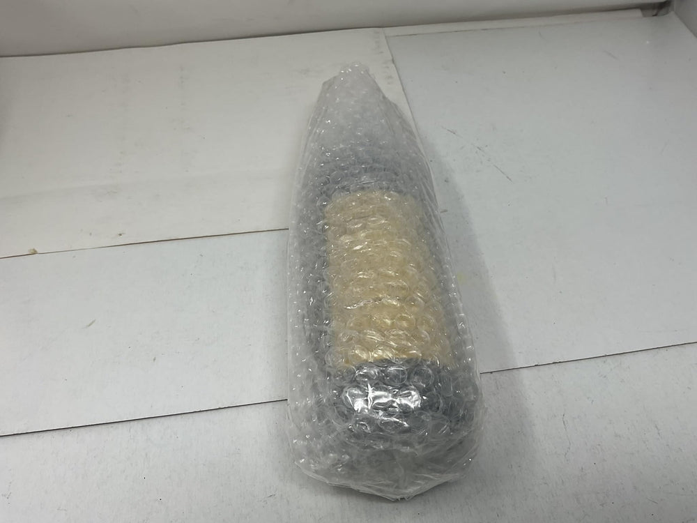 Pagoda Brand bottle next to hand for 640ml size and scale