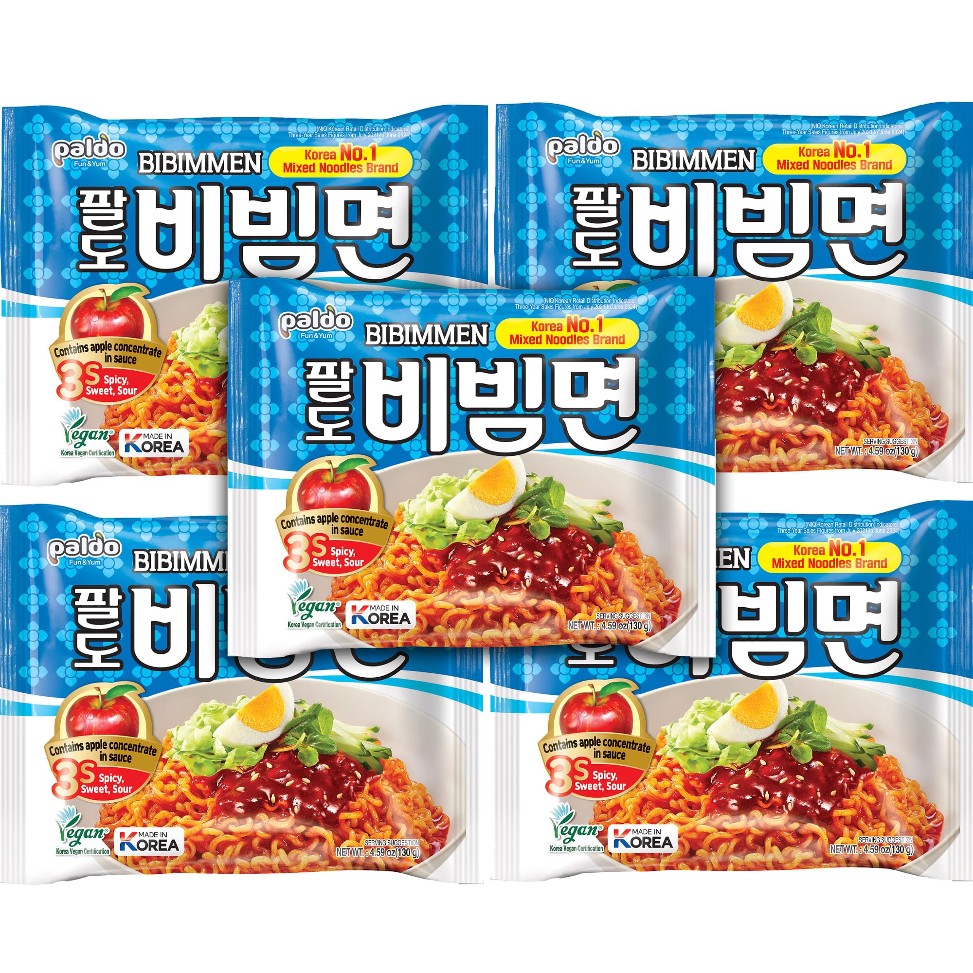 Opened Paldo sauce sachet beside noodles showing sweet and spicy paste for flavor