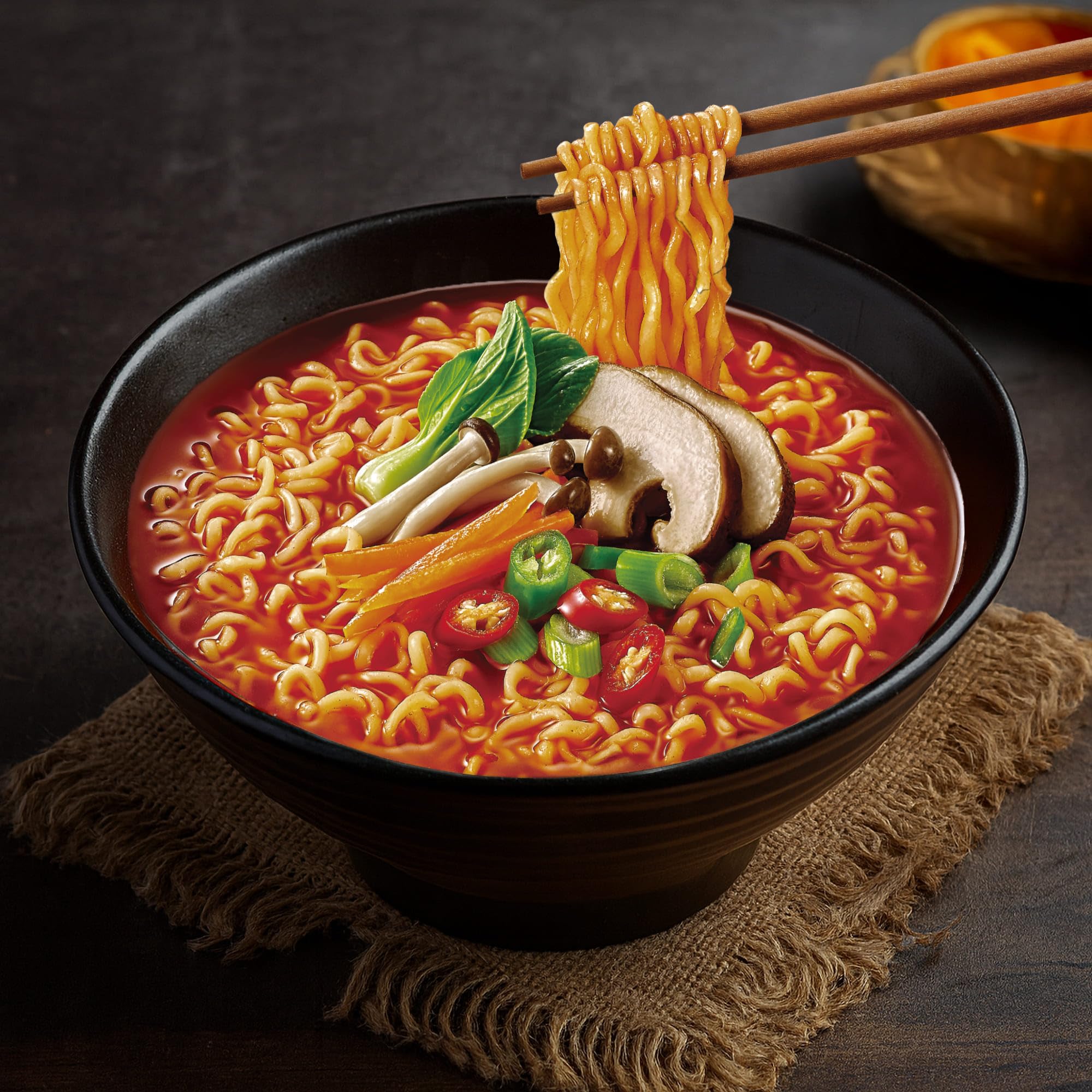 Paldo Hwa ramen in a kitchen scene demonstrating easy family meal preparation