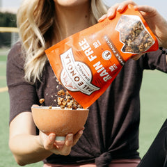 Bowl of Paleonola granola topped on yogurt for added flavor
