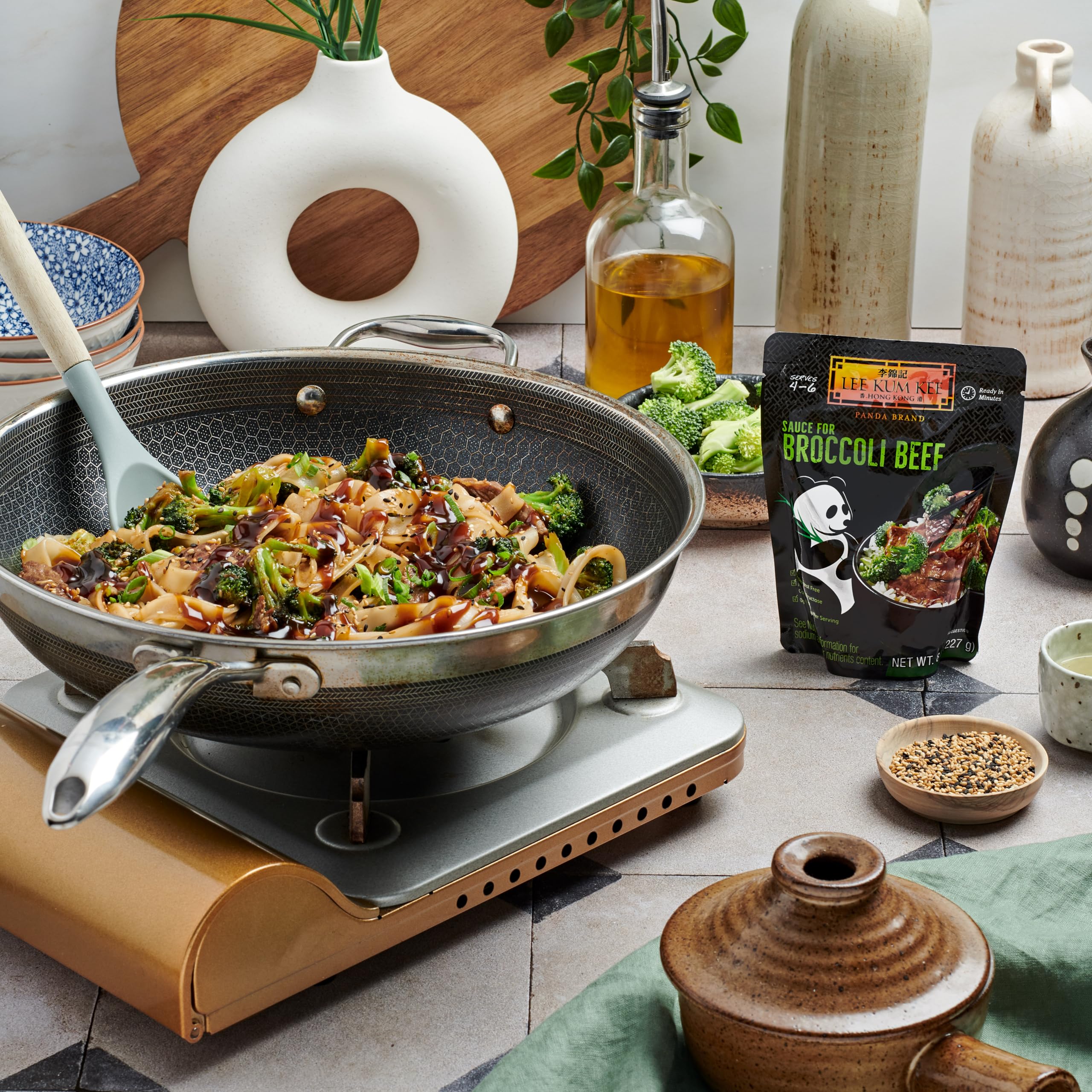 Panda Lee Kum Kee sauce poured into a skillet for fast stir-fry convenience