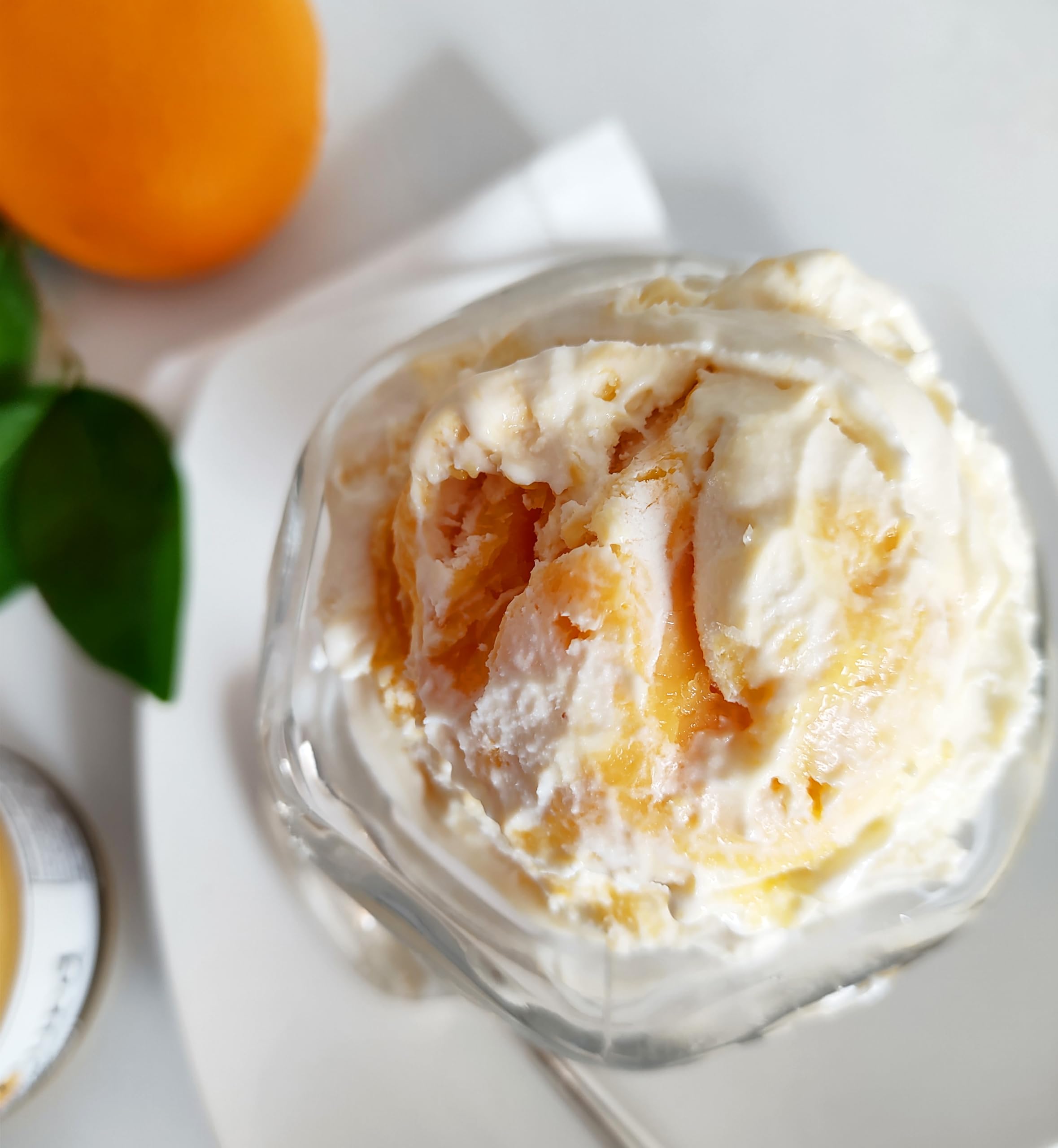 Paradigm Foodworks close-up of curd texture showing smoothness and rich orange flavor