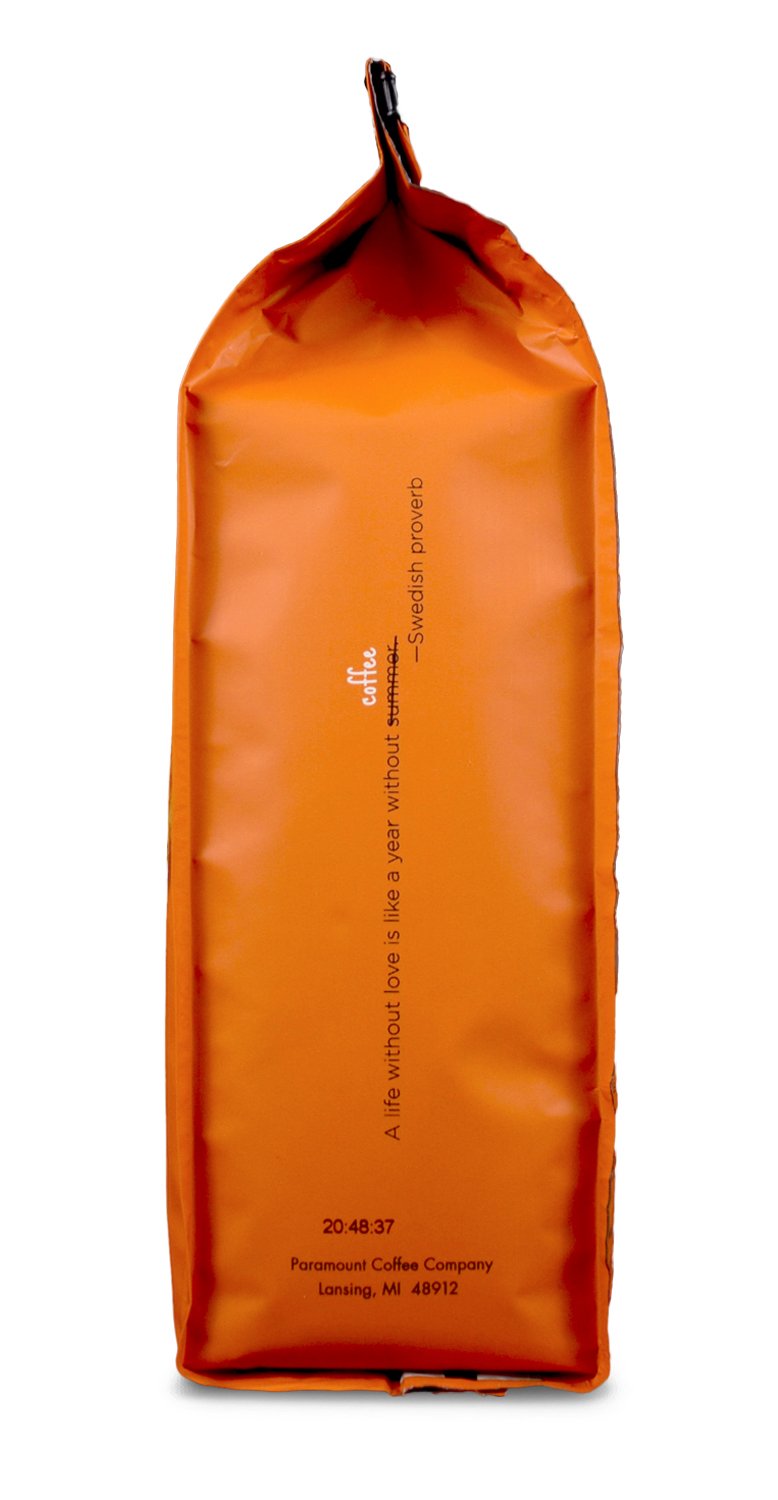 Paramount Roasters bag close-up label highlighting medium roast and seasonal availability benefit