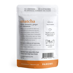 Paromi powder close-up showing fine stone-ground texture and vibrant color