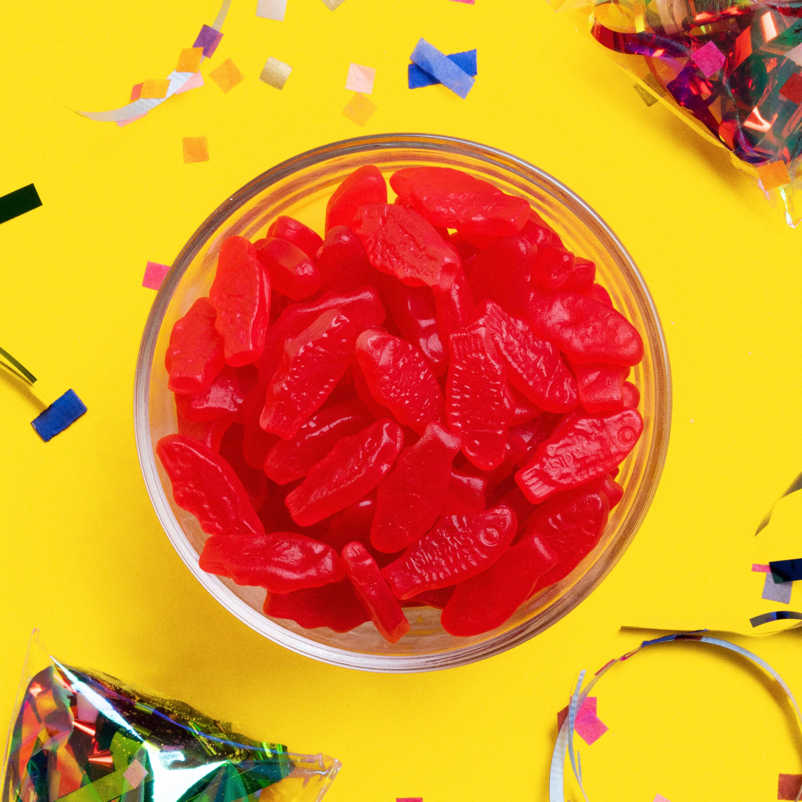 Party favor display with Sour Patch Kids and Swedish Fish bags ready to share