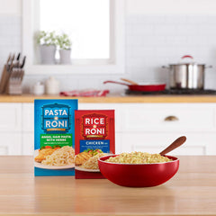 Pasta Roni box beside measuring cup illustrating single-serve size