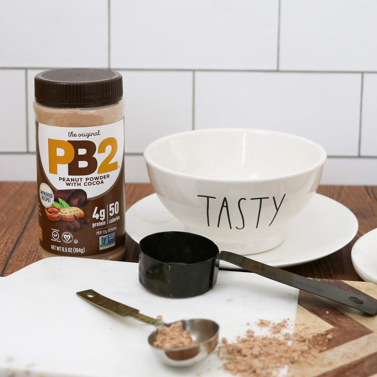 PB2 jars in a kitchen breakfast scene showing versatile use and convenience