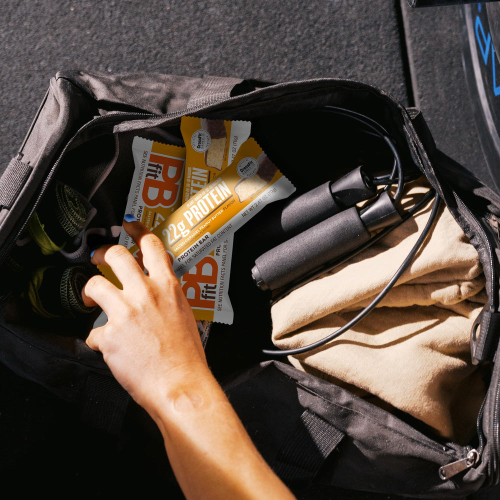 PBfit bar inside a gym bag illustrating on-the-go fueling before or after workouts