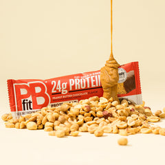 PBfit individually wrapped bar in hand for portable on-the-go convenience