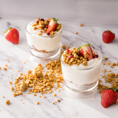 PBfit spoonful over yogurt topping demonstrating added protein and creamy contrast