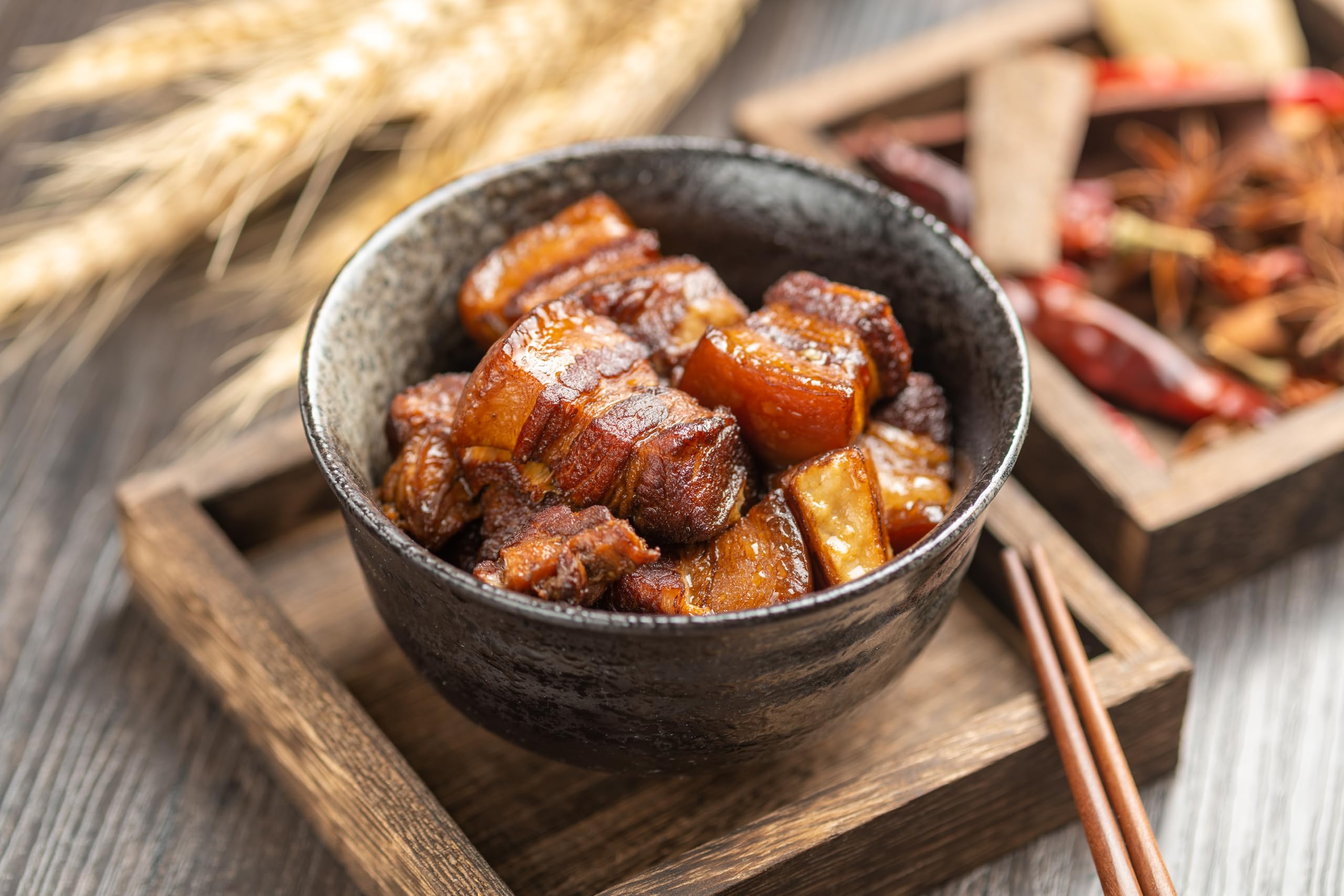 Cook adding Pearl River Bridge soy sauce to stir-fry, boosting savory flavor quickly