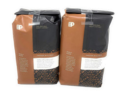 Peet's Coffee close-up of whole beans revealing roast texture, ensures freshness