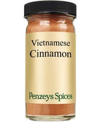 Penzeys jar front view showing label and rich cinnamon, enhancing baking flavor