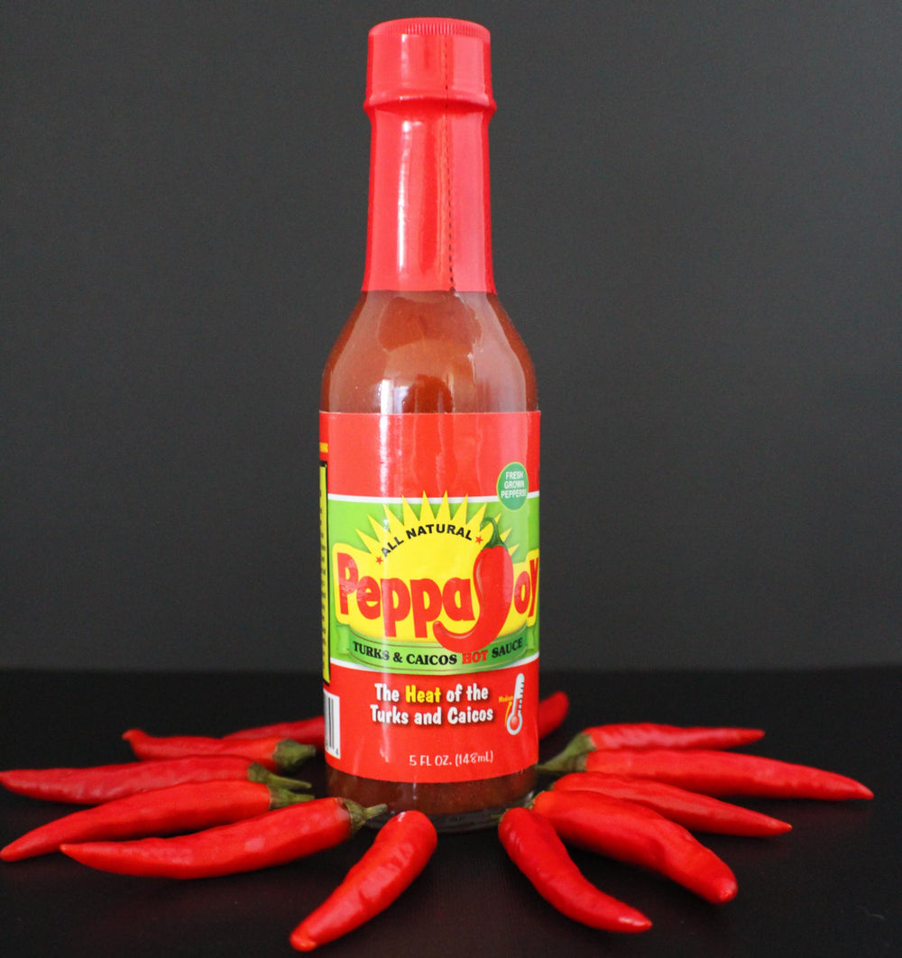 Peppajoy bottle held in hand shows 5oz scale and travel-friendly convenience