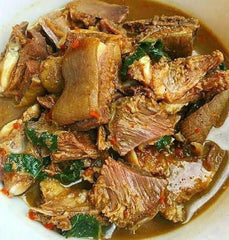 Pepper Soup Mix added to simmering pot showing easy cooking benefit