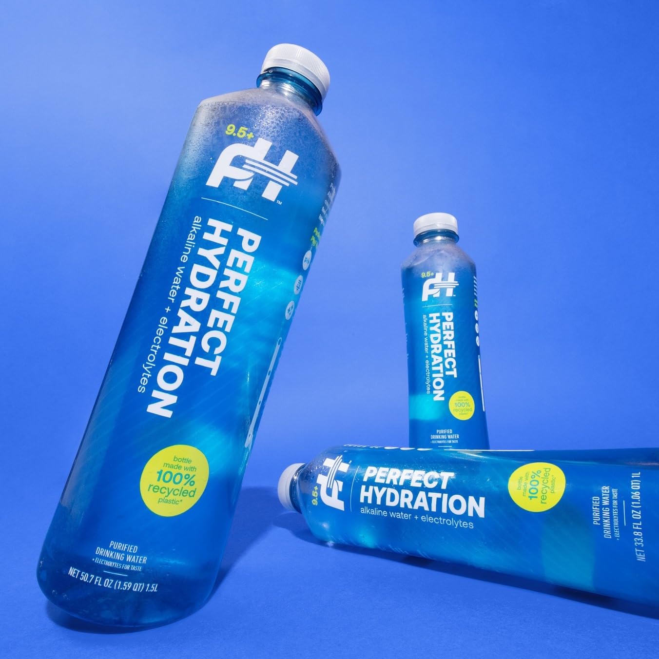 Perfect Hydration bottle in hand demonstrating easy-grip and larger capacity convenience