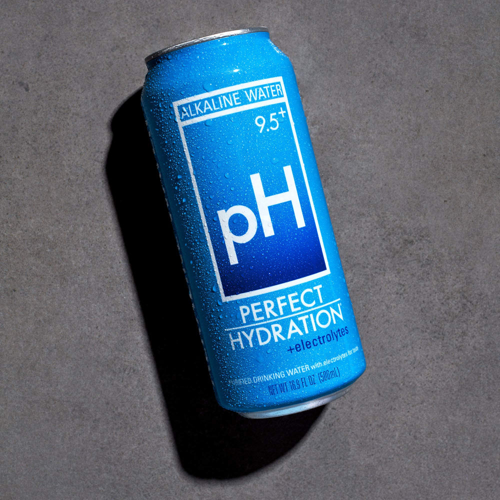 Perfect Hydration can placed in car cupholder illustrating portability benefit on the go