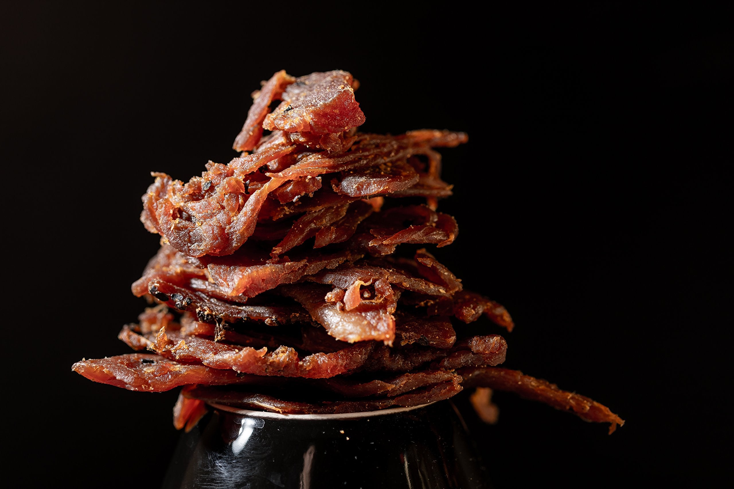 Perky Jerky nutrition label close-up showing 10g protein and low sodium benefits