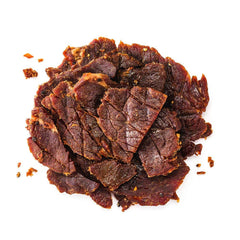 Perky Jerky resealable bag held in hand illustrating portability and freshness benefit