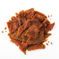 Perky Jerky turkey strips close up highlighting tender texture and flavor